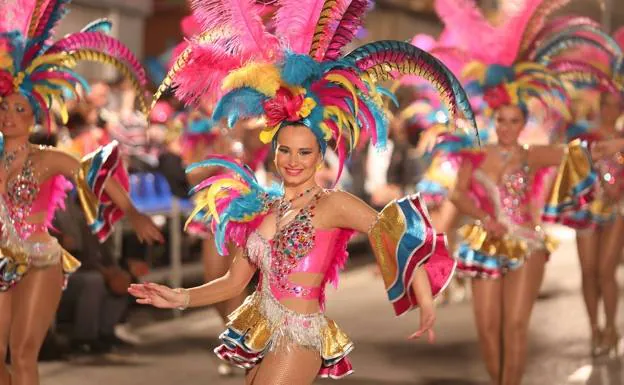 The carnivals of a peña dance in one of the 2020 parades. 