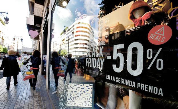 A store displays 'Black Friday' advertising. 