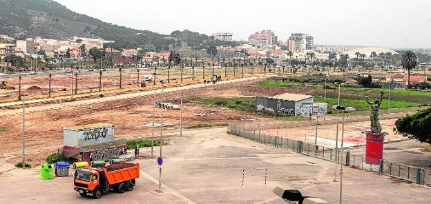 Construction works of the green corridor, next to the enclosure that houses the festive camp. 