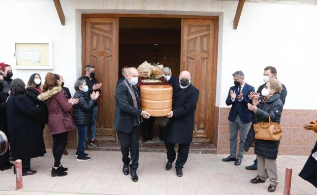 The coffin leaves the Puntas de Calnegre chapel after the funeral.