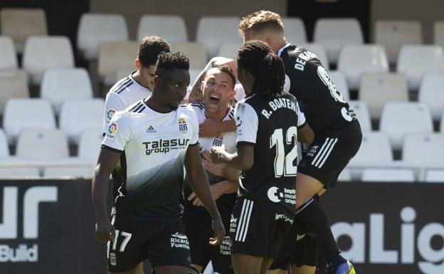 The FC Cartagena players celebrate one of the goals.