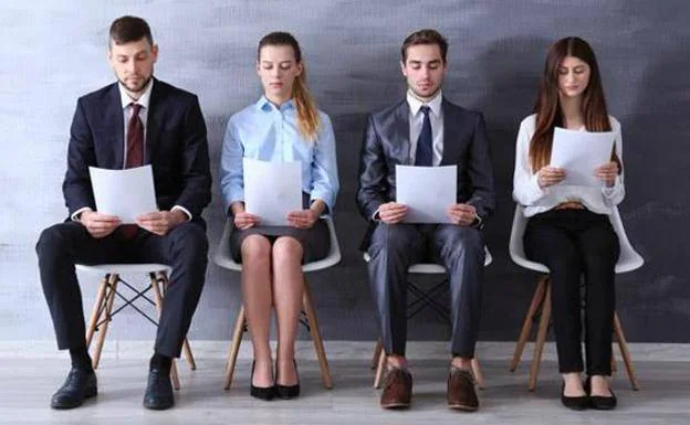 Candidates wait their turn for a job interview.