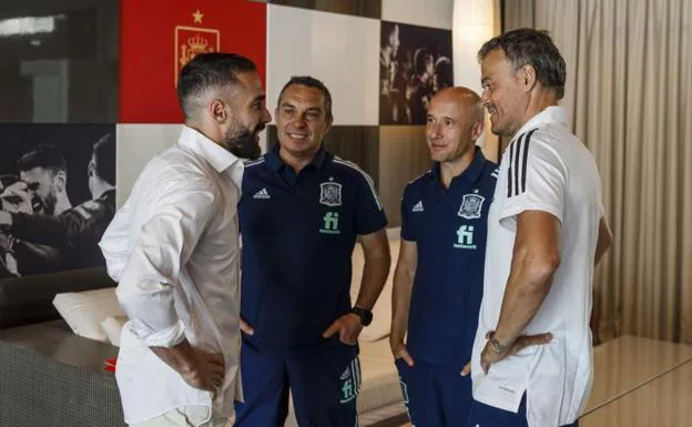Luis Enrique and his assistants greet Carvajal upon his arrival at the concentration camp in Spain.