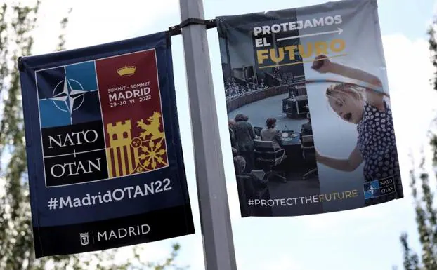 Poster announcing the summit in Madrid. 