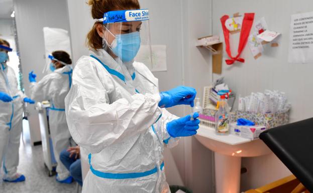 A santiaria prepares a PCR test, in a file photograph.