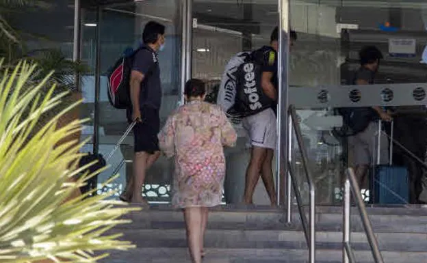 Tourists entering a hotel in La Manga, in a file image.