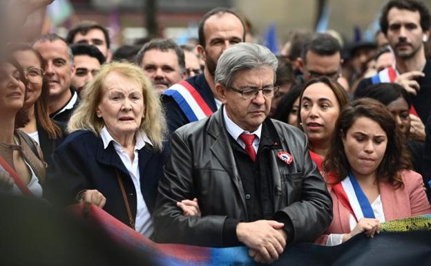 French novelist Annie Ernaux, winner of the 2022 Nobel Prize for Literature, led the march alongside Jean-Luc Melenchon.