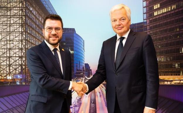 Didier Reynders shakes hands with Pere Aragonès.