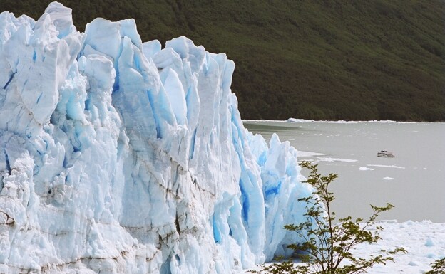 Imposing glacier enters Lago Argentino, in Patagonia.