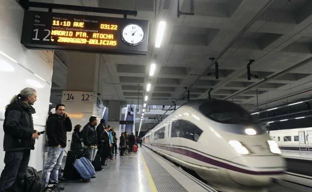 Some travelers wait at the Girona station, in a file image.